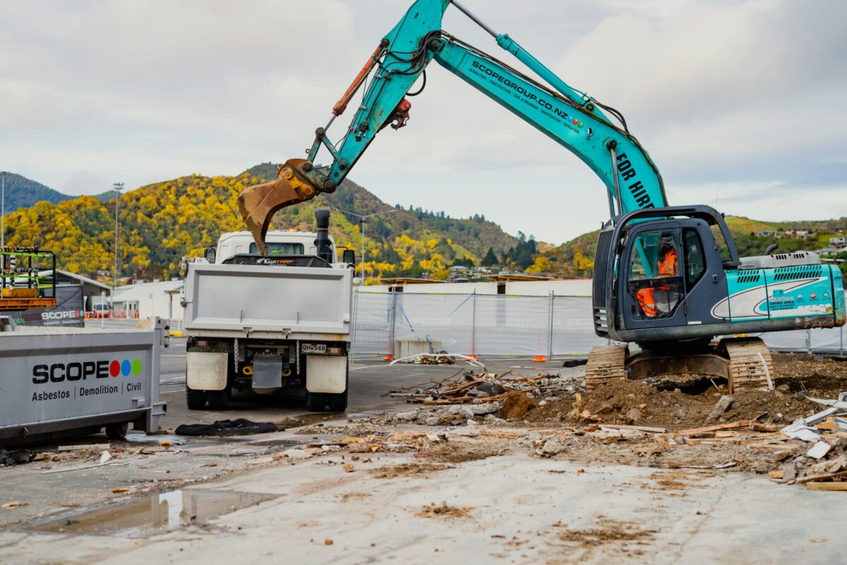 image of excavator at Picton terminal being demolished and stripped out by Scope Group, NZ