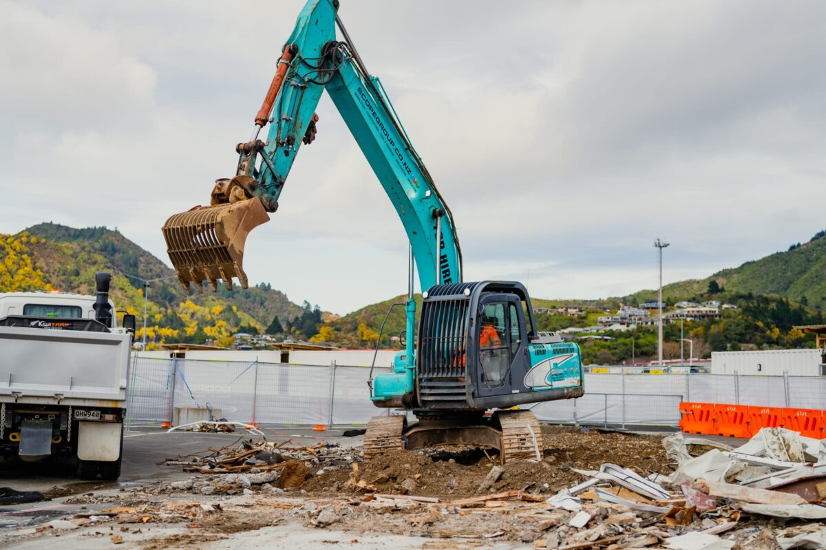 image of excavator at Picton terminal being demolished and stripped out by Scope Group, NZ