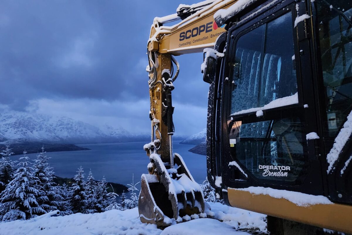 image of Scope Group excavator at snowy Queenstown Skyline Gondola in NZ