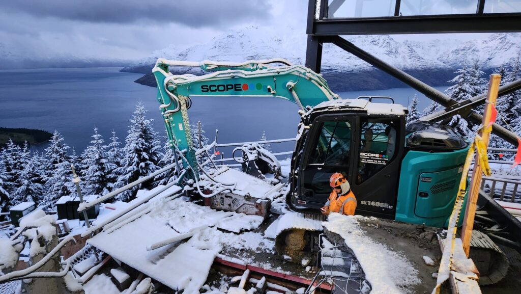 image of Scope Group providing demolition and deconstruction services to a snowy Queenstown Skyline Gondola in NZ